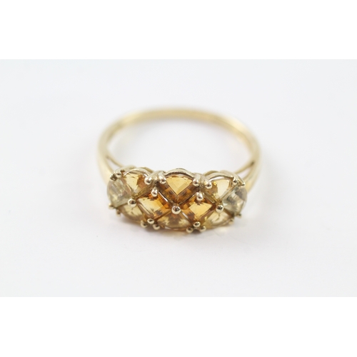 144 - 9ct gold citrine dress ring (2.6g) Size U