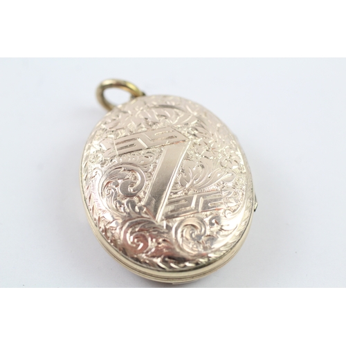 148 - 9ct gold back and front locket with enamel detailing (14.4g)