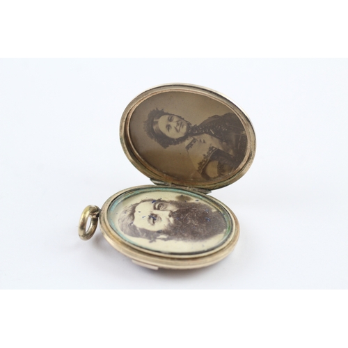 148 - 9ct gold back and front locket with enamel detailing (14.4g)