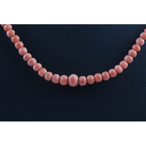 151 - 9ct gold clasped antique coral bead necklace, as found (12.2g)