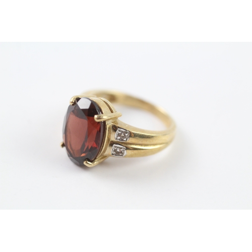 152 - 9ct gold garnet and white gemstone cocktail ring (6.3g) Size N 1/2