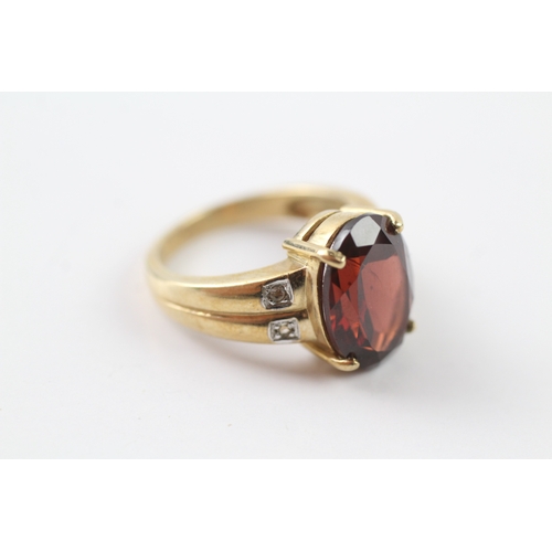 152 - 9ct gold garnet and white gemstone cocktail ring (6.3g) Size N 1/2