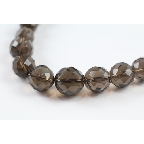 156 - 9ct gold clasped smoky quartz bead necklace by Whitney Kelly (72.6g)