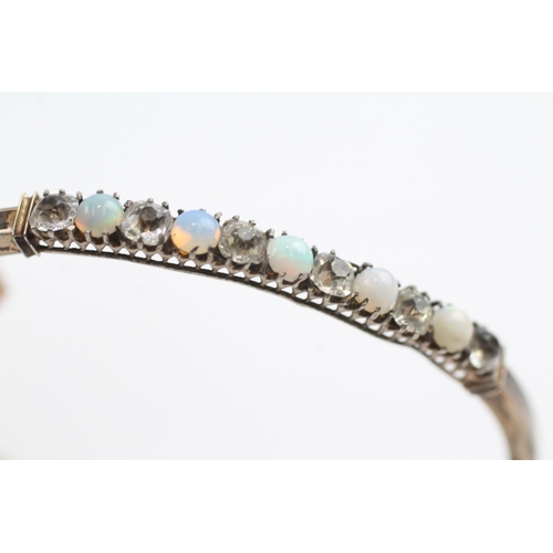 16 - 9ct gold opal and paste set bangle (6.1g)