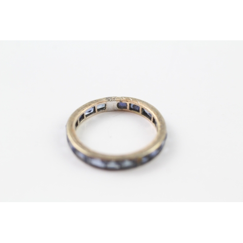 161 - 9ct gold sapphire eternity ring (1.9g) Size M 1/2