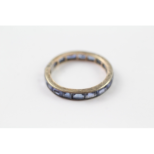 161 - 9ct gold sapphire eternity ring (1.9g) Size M 1/2