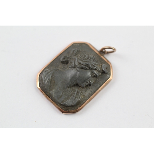 184 - 9ct gold cased lavastone cameo pendant (4.1g)