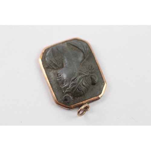 184 - 9ct gold cased lavastone cameo pendant (4.1g)