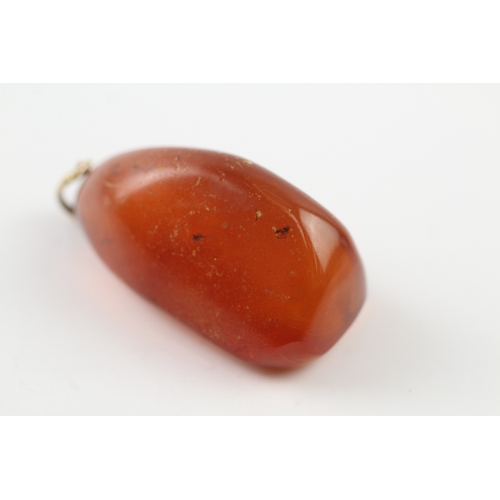 185 - 9ct gold Baltic amber pendant (14.6g)