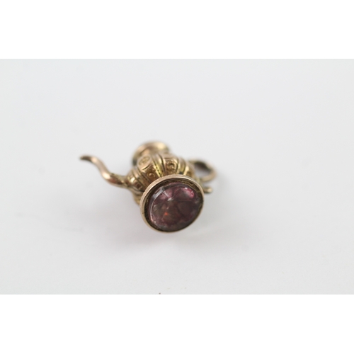 188 - 9ct gold antique teapot design seal charm (1.9g)