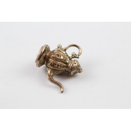 188 - 9ct gold antique teapot design seal charm (1.9g)