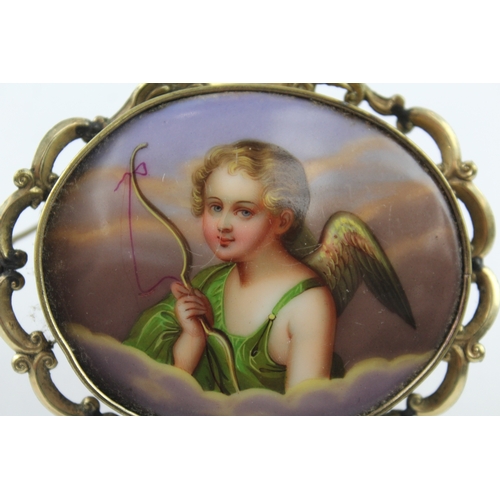 198 - A Victorian hand painted cherub brooch (29g)