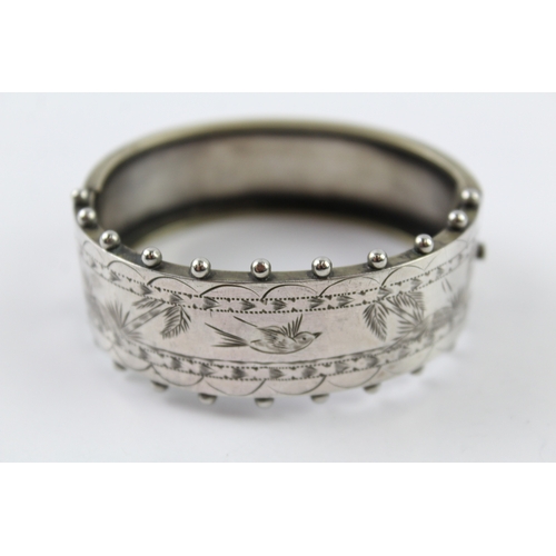 209 - A Victorian silver bangle (21.7g)