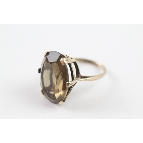 216 - 9ct gold vintage smokey quartz cocktail ring (5.9g) Size M