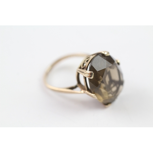 216 - 9ct gold vintage smokey quartz cocktail ring (5.9g) Size M