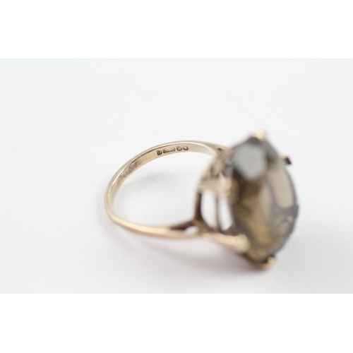 216 - 9ct gold vintage smokey quartz cocktail ring (5.9g) Size M