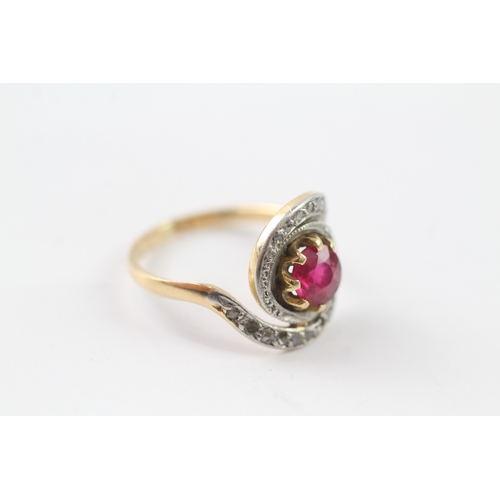 218 - 14ct gold diamond and ruby dress ring (3.6g) Size M