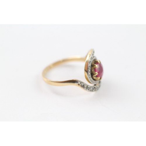 218 - 14ct gold diamond and ruby dress ring (3.6g) Size M