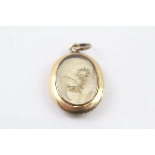 221 - 9ct gold mourning locket with enamel anchor detail (2.8g)