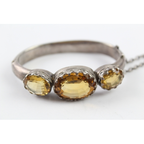 229 - A Victorian silver citrine set bangle (34g)