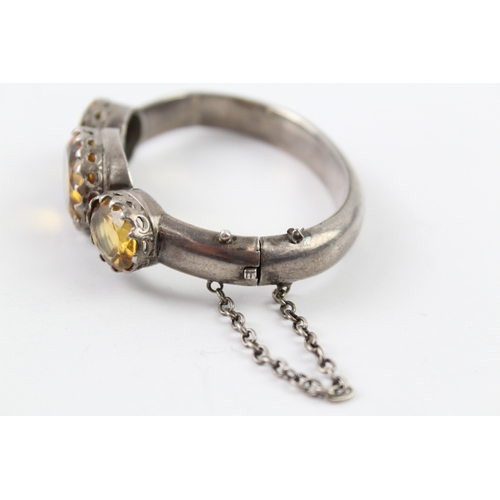 229 - A Victorian silver citrine set bangle (34g)