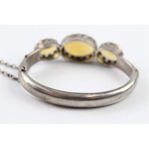 229 - A Victorian silver citrine set bangle (34g)