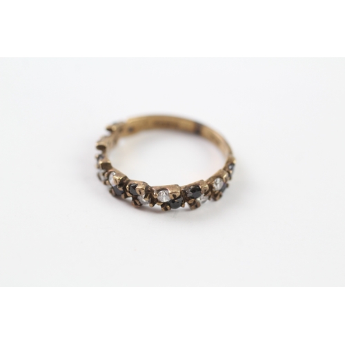 232 - 9ct gold sapphire and cz half eternity dress ring (2.2g) Size O