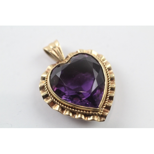 233 - 9ct gold amethyst heart pendant (6.2g)