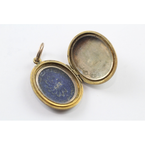 246 - 9ct gold back and front locket with enamel detail (7.8g)