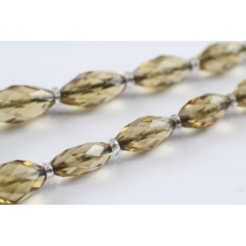 248 - 9ct gold clasp citrine and rock quartz graduated necklace (55.9g)