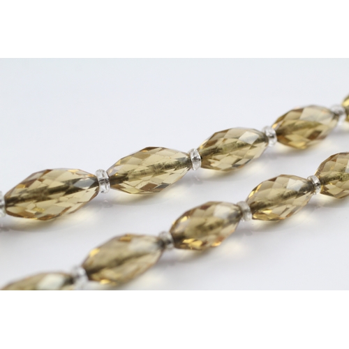 248 - 9ct gold clasp citrine and rock quartz graduated necklace (55.9g)