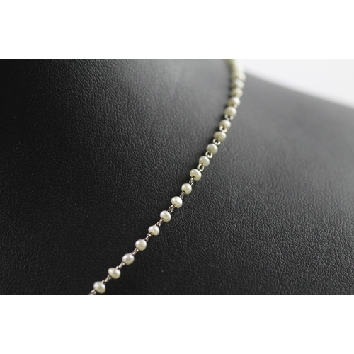 251 - 9ct gold antique natural pearl necklace (3.9g)

One pearl missing