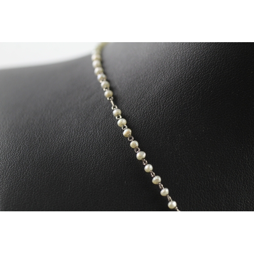 251 - 9ct gold antique natural pearl necklace (3.9g)

One pearl missing