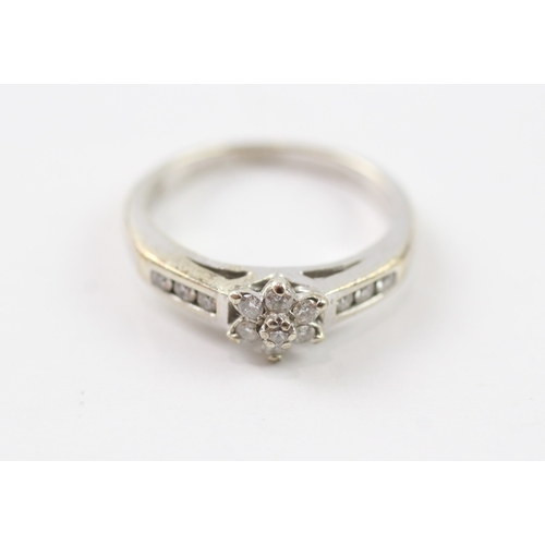 255 - 9ct gold diamond set dress ring (2.4g) Size I 1/2