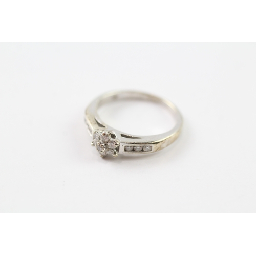 255 - 9ct gold diamond set dress ring (2.4g) Size I 1/2