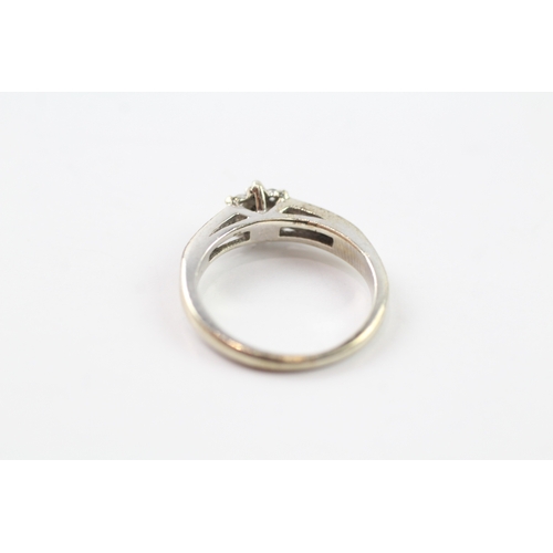 255 - 9ct gold diamond set dress ring (2.4g) Size I 1/2