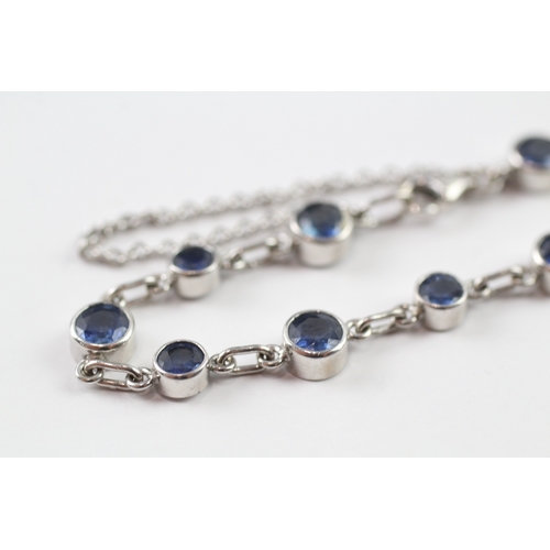 264 - 18ct white gold sapphire bracelet (9.5g)
18.5cm long