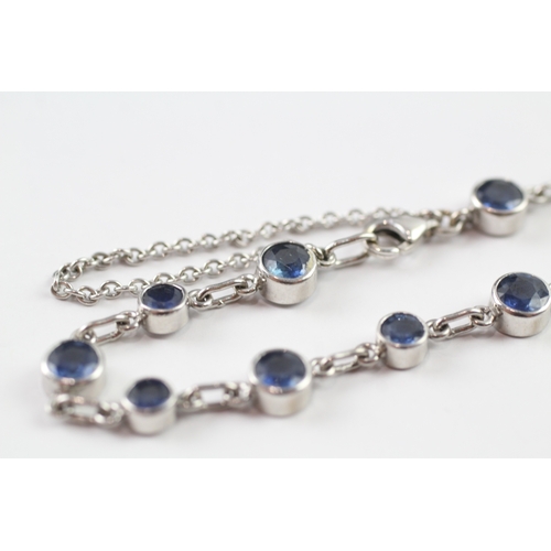 264 - 18ct white gold sapphire bracelet (9.5g)
18.5cm long