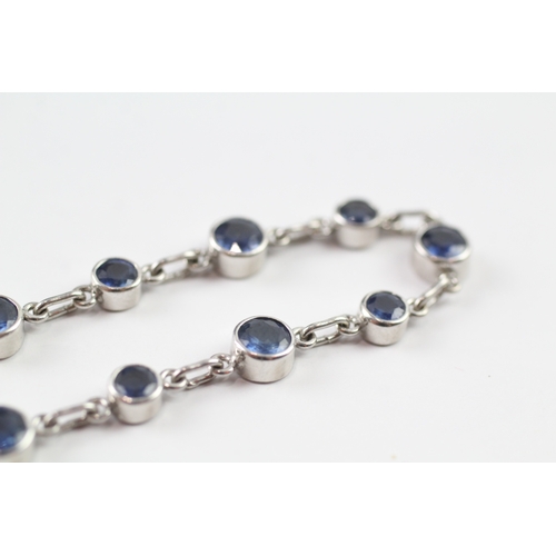 264 - 18ct white gold sapphire bracelet (9.5g)
18.5cm long