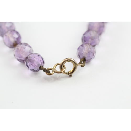 268 - 9ct gold clasped amethyst bead necklace (45.6g)