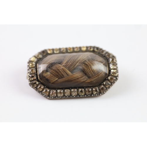 286 - 19th century gold and silver mourning brooch with paste and hairwork (7g)