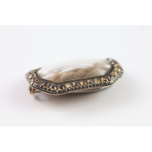 286 - 19th century gold and silver mourning brooch with paste and hairwork (7g)