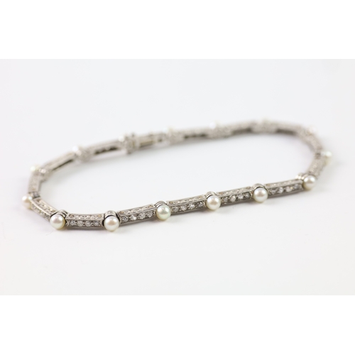 29 - 800 platinum diamond and pearl tennis bracelet (10.7g)