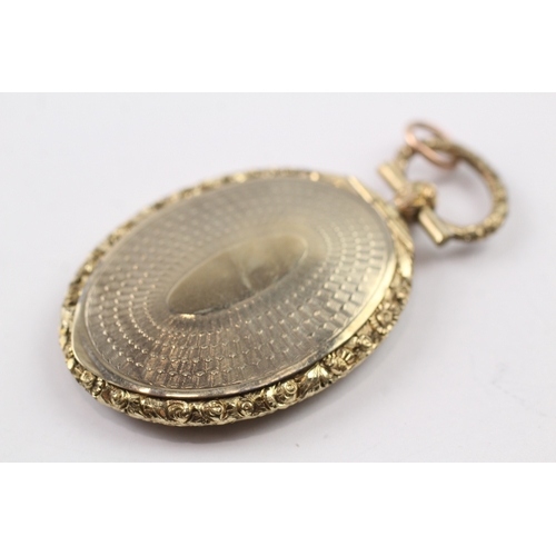 294 - 9ct gold back and front Victorian mourning locket (14.8g)