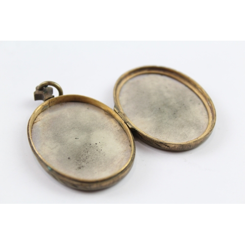 306 - A Japanese Shakudo and mother of pearl locket (15g)