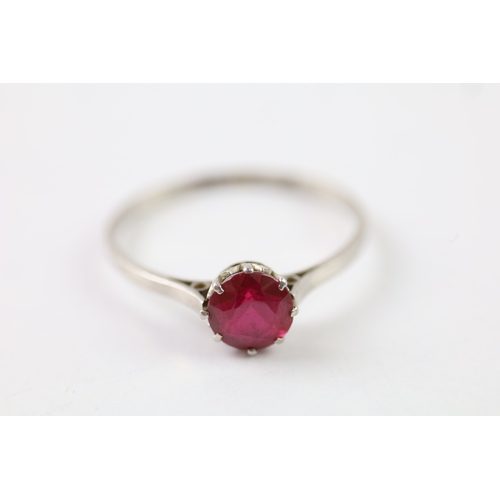 313 - .900 platinum ruby solitaire ring (2.1g) Size Q