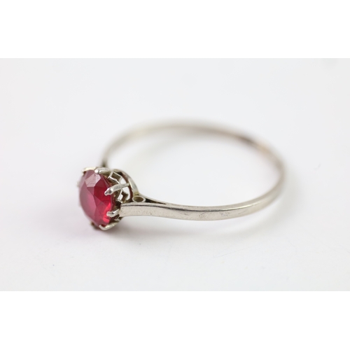 313 - .900 platinum ruby solitaire ring (2.1g) Size Q