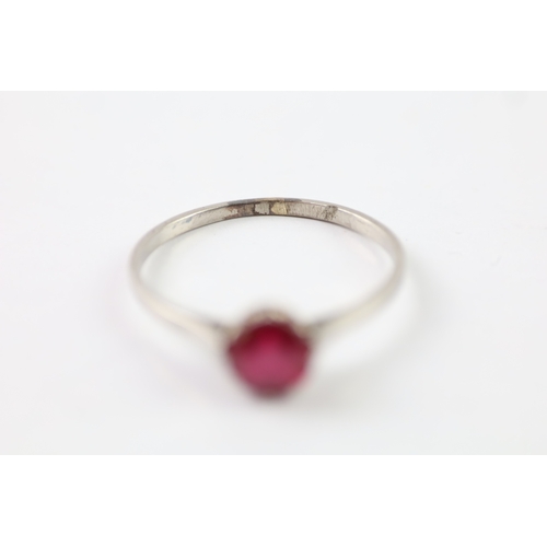 313 - .900 platinum ruby solitaire ring (2.1g) Size Q