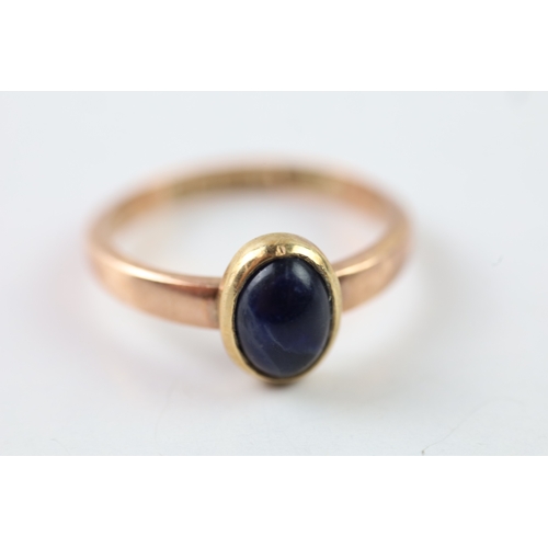 318 - 9ct gold blue gemstone ring (3.1g) Size O