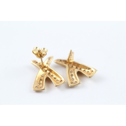 322 - 9ct gold cubic zirconia set cross earrings (4.8g)